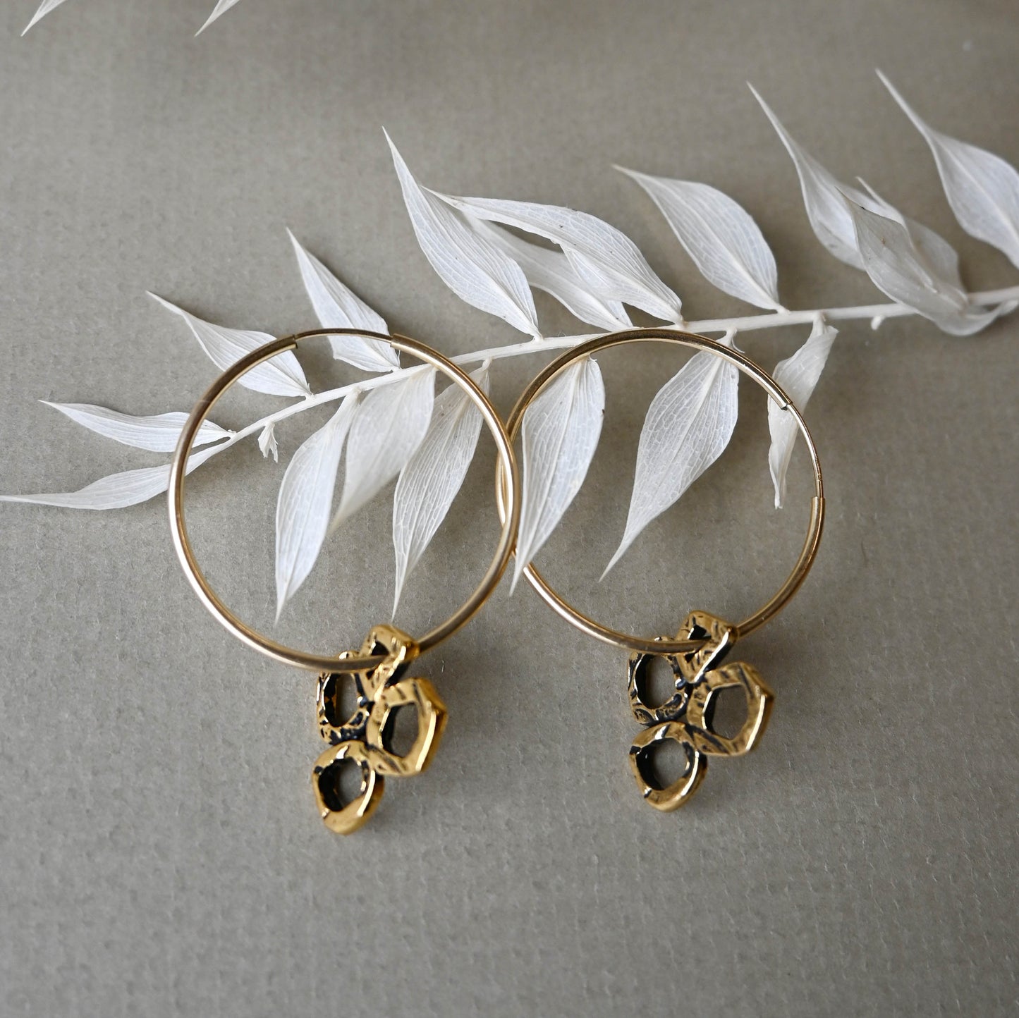 Brenda Wong, Gold Hoops with Clover Charms