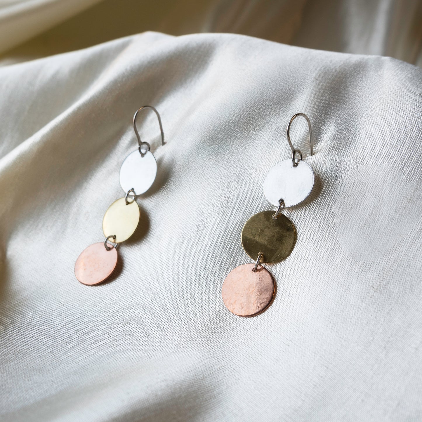 Galili Ellis, Mixed Metal Dangles with Brass, Copper, and Silver