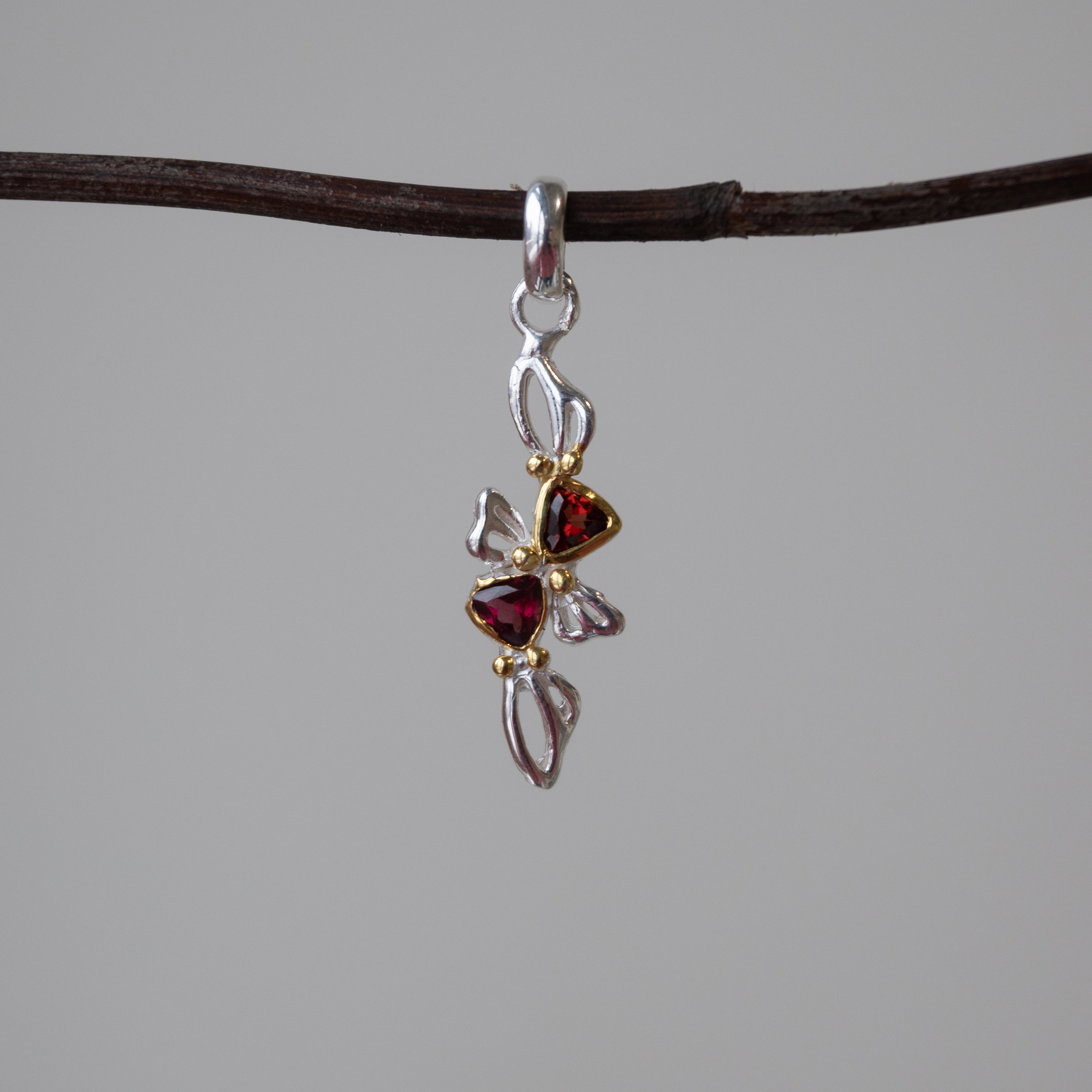 Out Designs, Garnet Bow Pendant
