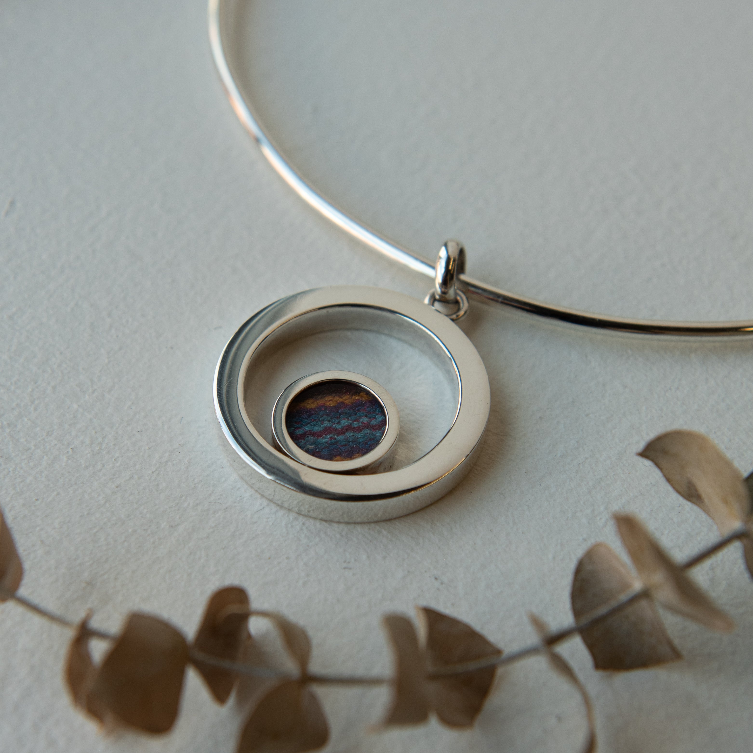 Alexandra Temple, Round Silver Pendant with Inca Fabric